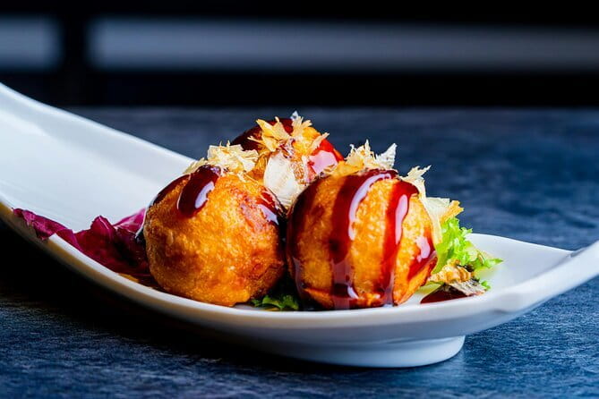 Eat Like a Japanese with a Local Guide - Stop 1 at Takohachi Dotonbori: takoyaki with the classic gooey center