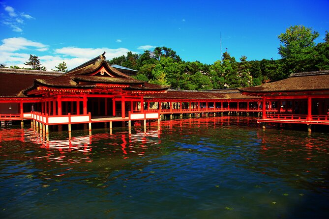 Hiroshima & Miyajima 1 Day Bus Tour with Bullet Train Tickets - The Switch to Miyajima: Ferry Ride and Great Torii Photo Time