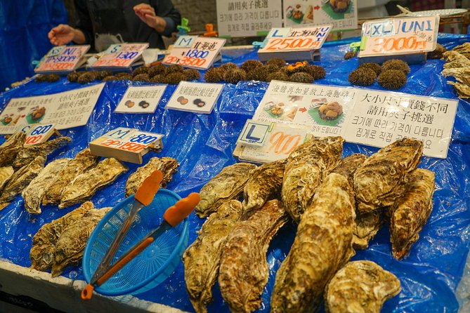 Kuromon Market Food Walking Tour in Osaka (6 stops, 6 tastes) - Namba, Nanba Grand Kagetsu, and the City Vibe Shift