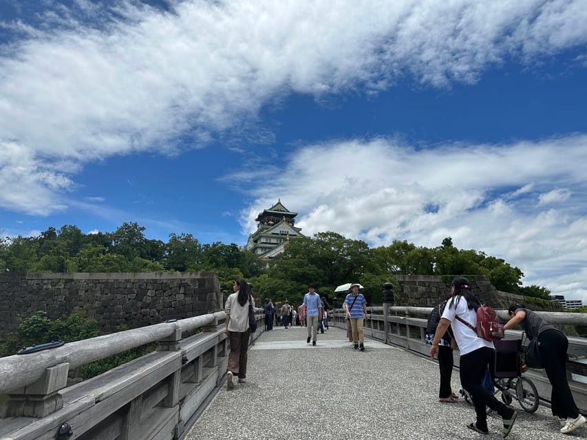 Osaka: A Private Guided Walking Tour of 5 Must-See Sights - Kuromon Ichiba Market: your best shot at local bites