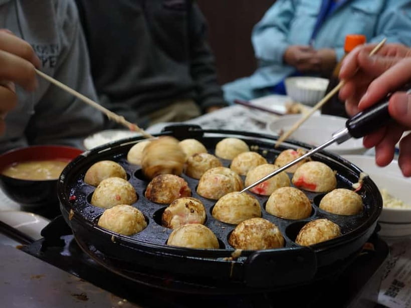 Osaka: Food Tour Kuromon Market & Dotonbori with Guide - Kuromon Market at Wanaka and Mitoya: Street Food That’s Easier With a Plan