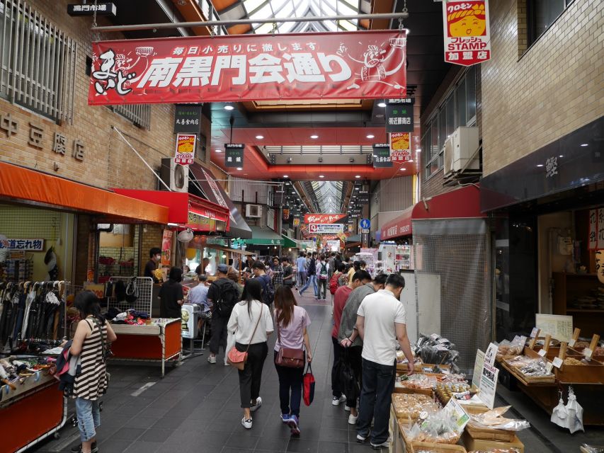 Osaka: Full-Day Sightseeing Tour by Private Vehicle - Dotonbori: the Times Square comparison, but with better side streets