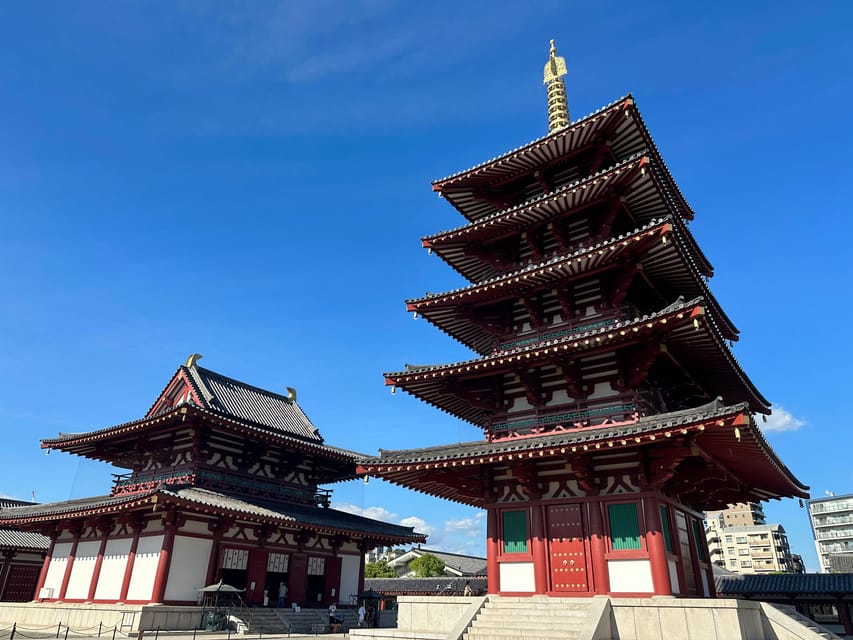 Osaka: Japan’s Oldest Temple & Bone Buddha Walking Tour - Isshinji Temple’s Modern Gate and the Bone Buddha Tradition