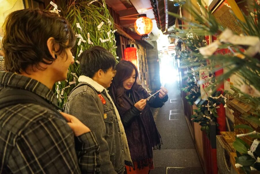Osaka: Local Foodie Tour in Dotonbori and Shinsekai - The 1.2-meter history alley, a temple pause, then the shift to Dotonbori