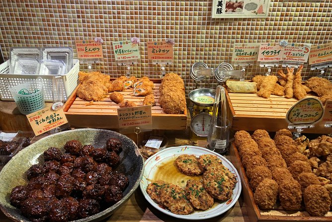 Osaka Private Food Tours by Local Foodies: 100% Personalized - An old-lane izakaya break: mossy temple calm and skewers with sake