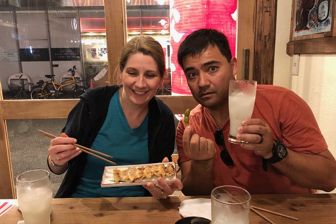 Osaka Private Food Tours by Local Foodies: 100% Personalized - Covered arcade street food: matcha desserts and kushikatsu energy