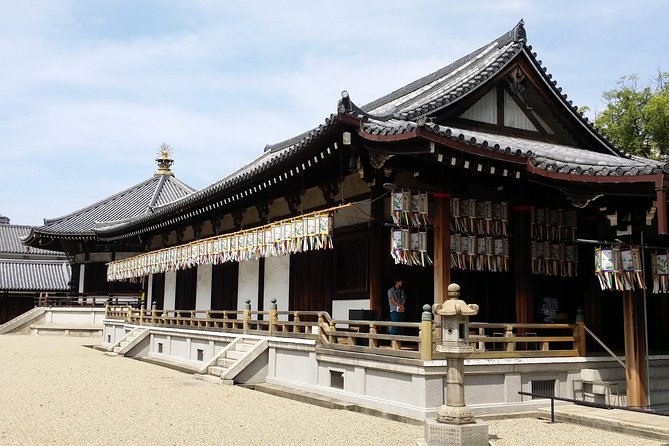 Osaka’s Best and Brightest: Private Full-Day Tour by Vehicle - Shinsekai: retro Osaka, food-and-games mood