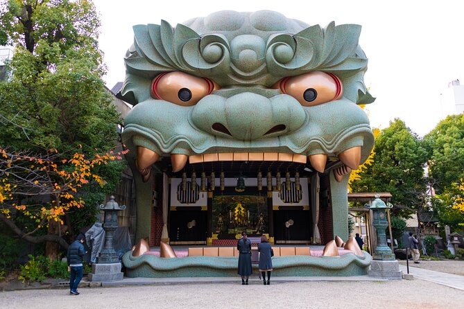 Osaka Unveiled Private Tour: Bustling Streets to Serene Shrines - Namba Yasaka Jinja: the calm finish and the lion’s mouth belief